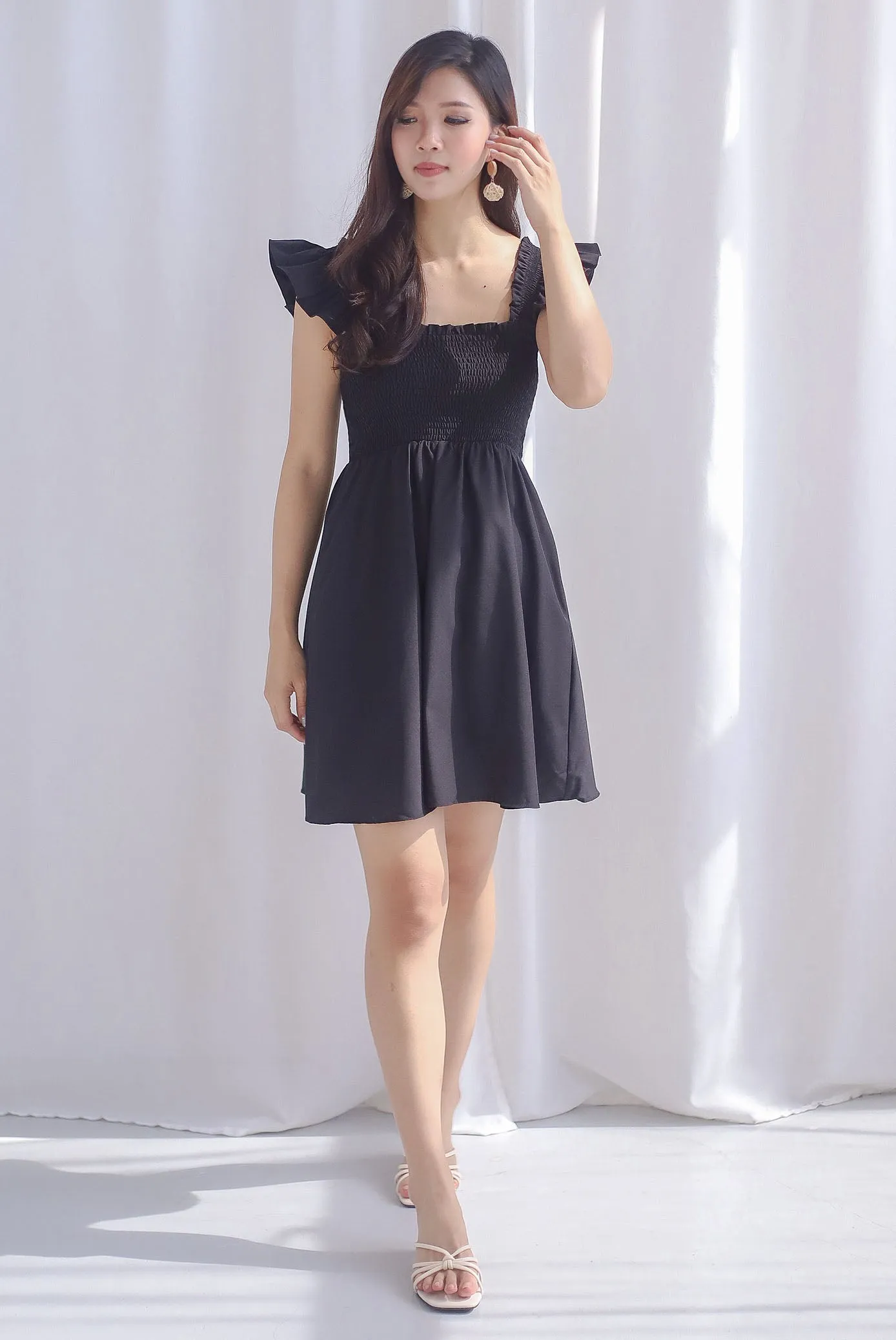 Shayna Smocked Ruffle Strap Romper Dress In Black