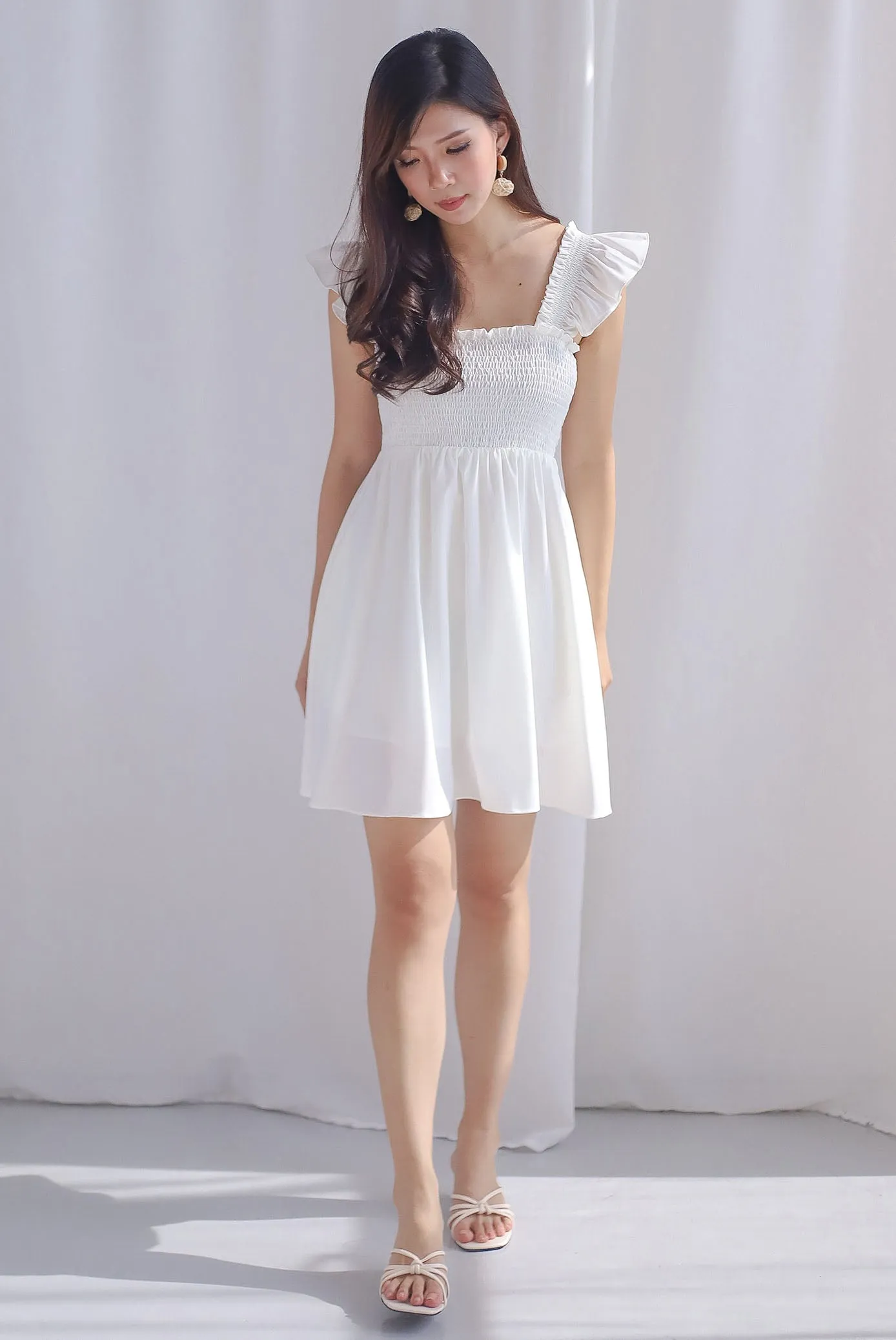 Shayna Smocked Ruffle Strap Romper Dress In White