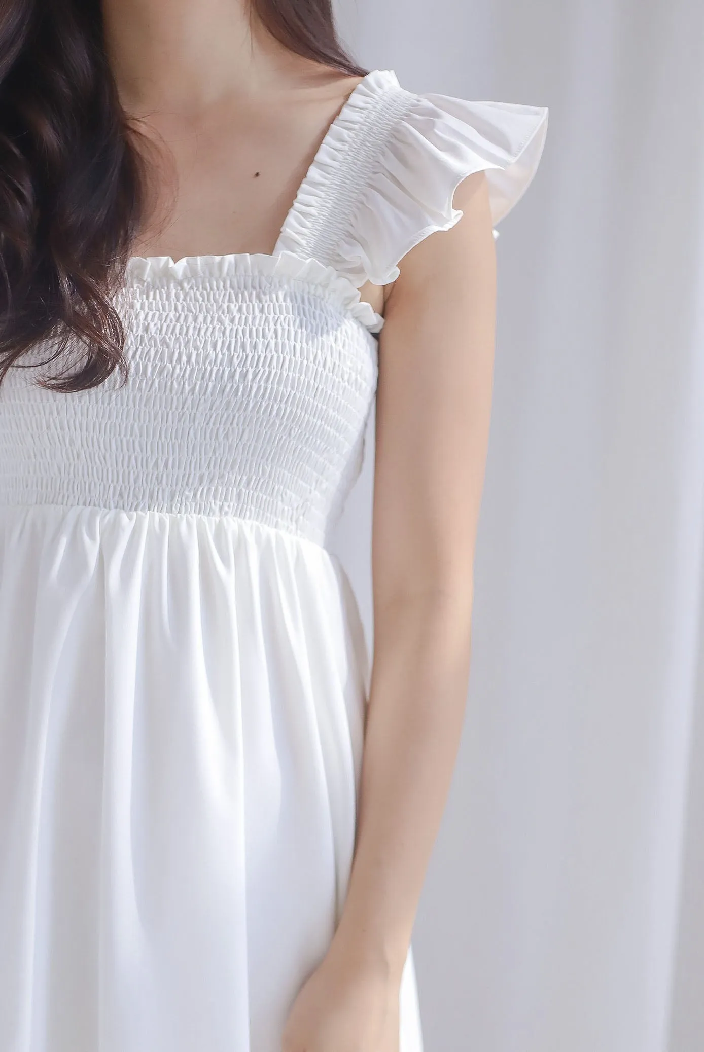 Shayna Smocked Ruffle Strap Romper Dress In White