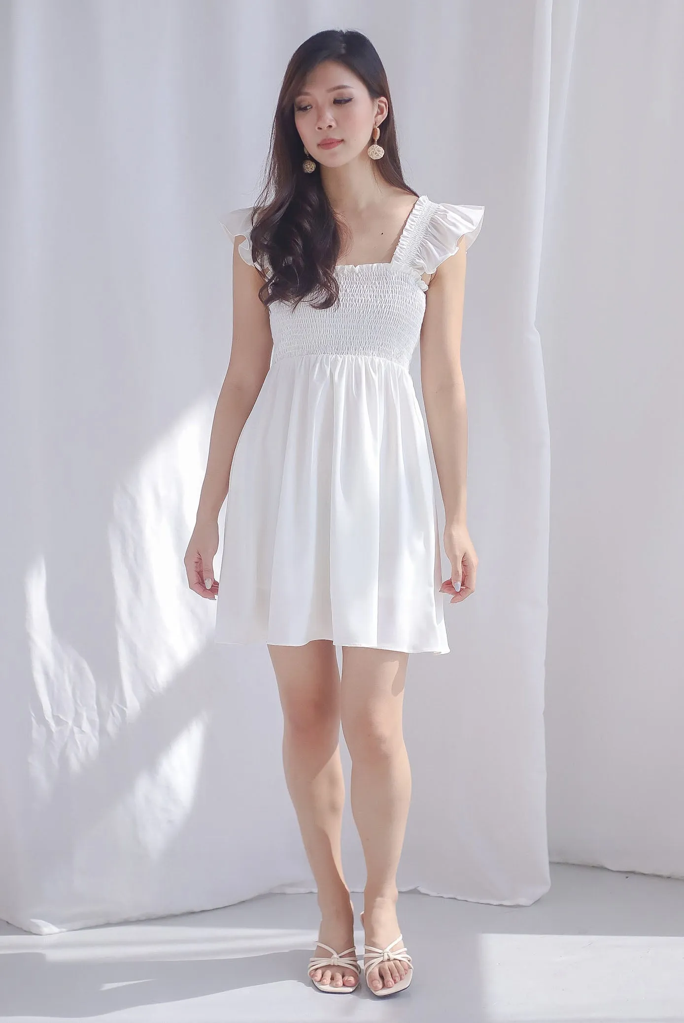 Shayna Smocked Ruffle Strap Romper Dress In White